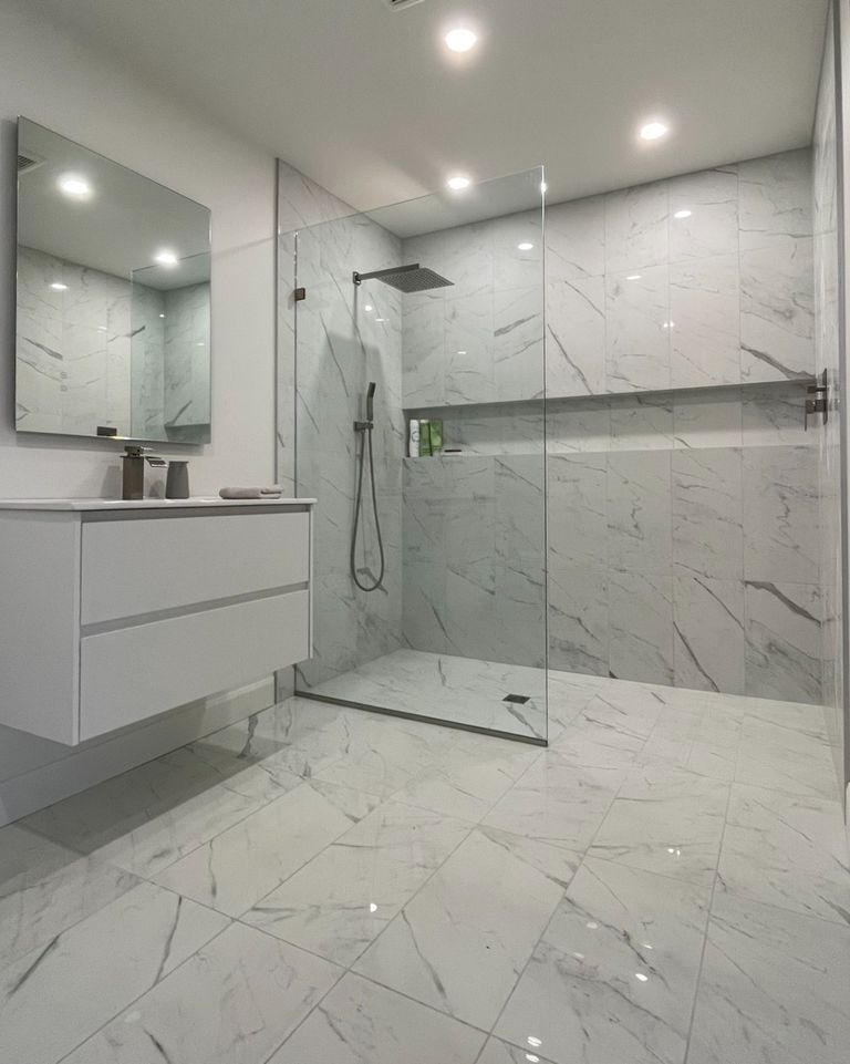Owen Sound Contractor - Carpenter - Bathroom Renovation - Kitchen Renovation - Cost - Flooring Installer - Tile Installer - Tile Shower - Custom Bathroom - Renovation Costs - Drywall Repair - Painting - Siding 